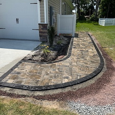 Professionally-Installed-Paver-Walkway-With-Vinyl-Trash-Can-Enclosure-In-Selbyville-DE 1